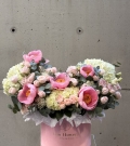 Hatbox with salmon peonies