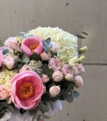 Hatbox with salmon peonies