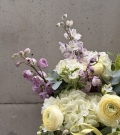 Exotic flowers in hatbox “Green softness”